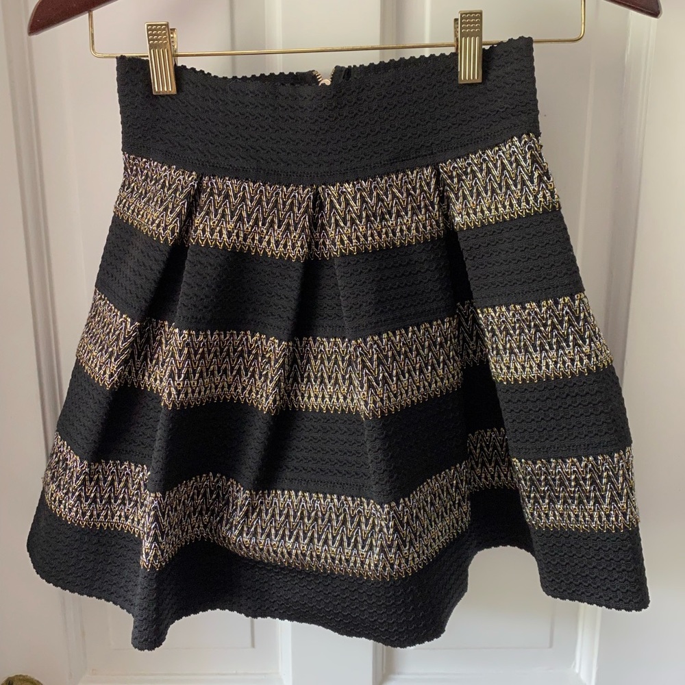 Black and gold Ginger G pleated skirt